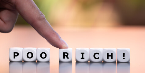 Hand moves dice and changes the word 