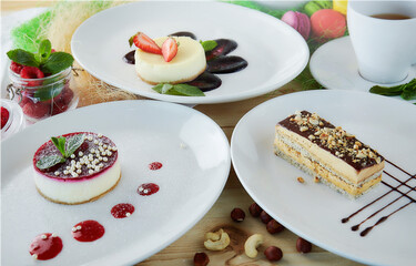 composition of desserts on a light background. Cakes with fruit and a cup of tea