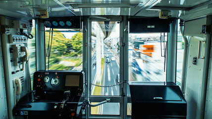 The suspened monorail system in Chiba, Japan, motion blurred view from inside the