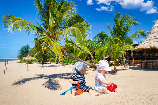 Boy and girl twins on the tropical holidays in Thailand