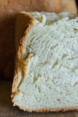 Freshly baked bread was baked at home in a bread maker