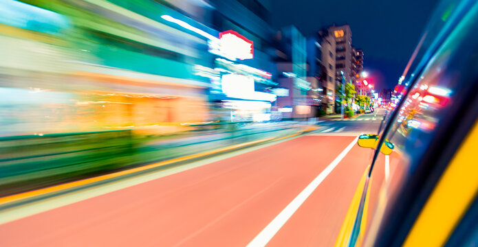 Motion Blurred Drive Through Tokyo, Japan At Night