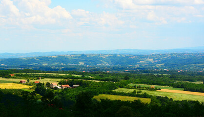 Fototapeta na wymiar landscape with green fields and blue sky