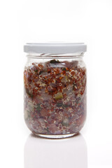 Nutrition concept - Healthy food, Diet, Detox, Clean Eating or Vegetarian concept. A nutritious food on glass jars against white background. Delicious salad in a glass jar. 