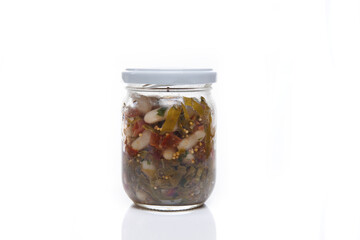 Nutrition concept - Healthy food, Diet, Detox, Clean Eating or Vegetarian concept. A nutritious food on glass jars against white background. Delicious salad in a glass jar. 