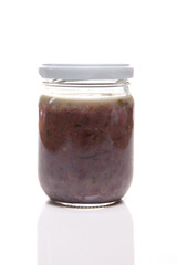 Nutrition concept - Healthy food, Diet, Detox, Clean Eating or Vegetarian concept. A nutritious food on glass jars against white background. Sauce in a glass bowl.
