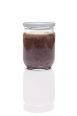Nutrition concept - Healthy food, Diet, Detox, Clean Eating or Vegetarian concept. A nutritious food on glass jars against white background. Sauce in a glass bowl.