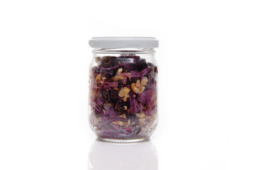 Nutrition concept - Healthy food, Diet, Detox, Clean Eating or Vegetarian concept. A nutritious food on glass jars against white background. Delicious salad in a glass jar. 