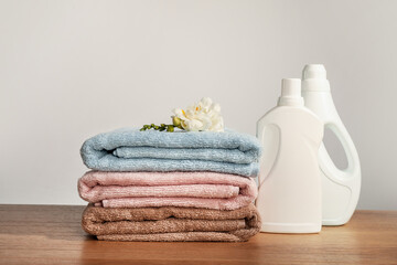 Fototapeta na wymiar Clean and fresh bath towels and washing powder