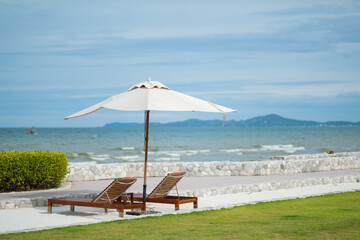 Fototapeta premium beach chair with umbrella, summer time, Vacation 