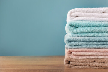 Obraz na płótnie Canvas Pile of rainbow colored towels isolated