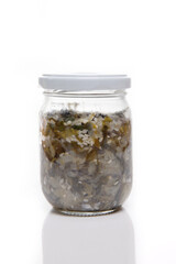 Nutrition concept - Healthy food, Diet, Detox, Clean Eating or Vegetarian concept. A nutritious food on glass jars against white background. Delicious salad in a glass jar. 