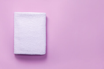 Folded white bath towel