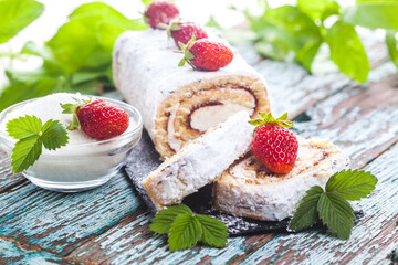 tasty strawberry dessert on a slate board on a turquoise wooden table. Homemade Fresh Baking