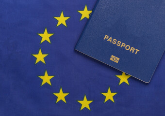 Travel concept. Passport against the background of Euro Union flag