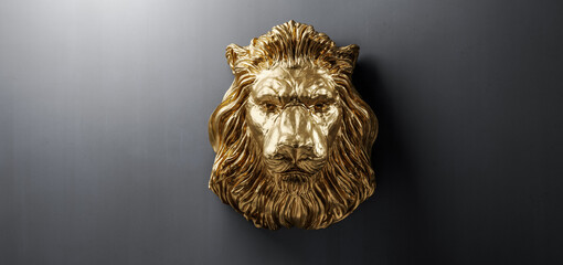 Golden statue of lion, a head sculpture on wall
