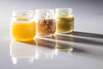 Nutrition concept - Healthy food, Diet, Detox, Clean Eating or Vegetarian concept. A glass jar of nutritious food against white background. Delicious take away food in glass jars.