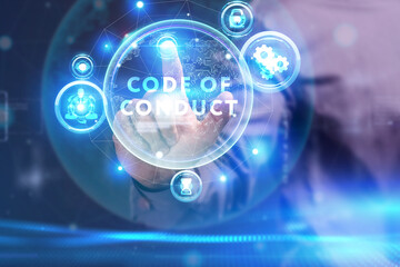 Business, Technology, Internet and network concept. Young businessman working on a virtual screen of the future and sees the inscription: Code of conduct