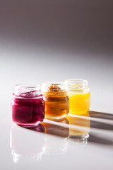 Nutrition concept - Healthy food, Diet, Detox, Clean Eating or Vegetarian concept. A glass jar of nutritious food against white background. Delicious take away food in glass jars.