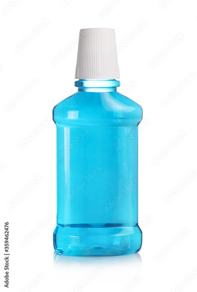 Wall mural Blue mouthwashin in transparent bottle