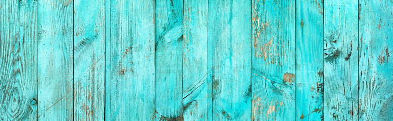 Weathered blue wooden background texture. Shabby wood teal or turquoise green painted. Vintage beach wood backdrop.