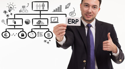 Business, technology, internet and network concept. Young businessman thinks over the steps for successful growth: ERP
