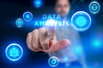 Fototapeta premium Business, Technology, Internet and network concept. Young businessman working on a virtual screen of the future and sees the inscription: Data analysis