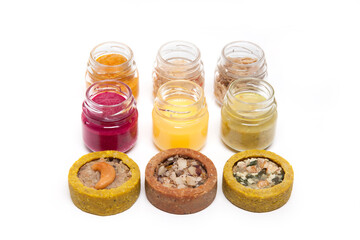 Nutrition concept - Healthy food, Diet, Detox, Clean Eating or Vegetarian concept. Glasses of food and small quiches. Nutritious food against white background. 