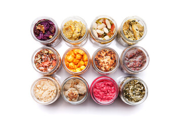 Nutrition concept - Healthy food, Diet, Detox, Clean Eating or Vegetarian concept. A glass jar of nutritious food against white background. Delicious take away food in glass jars.