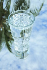 A glass of water on the mirror