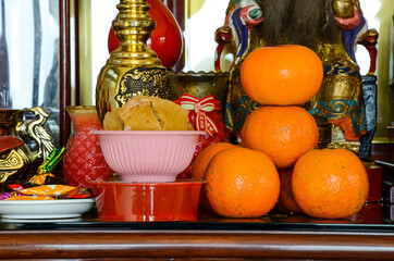 chinese offering with mandarin tower and  steamed sponge cake