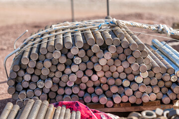 View of the steel anchor bolts in the construction site. are used to connect structural and...