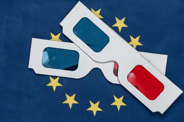 Anaglyph 3D glasses on the background of the Euro union flag. European cinema