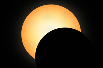 Partial solar eclipse. The silhouette of the moon.