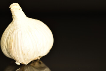 garlic on black background