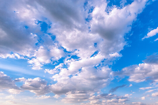 Background of the clouds and beautiful blue sky. Two cirriform clouds that form higher up in the stratosphere and mesosphere have common names for their main types.