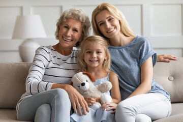 Happy family portrait, Mothers or International Womans Day holiday celebrations concept. Elderly...