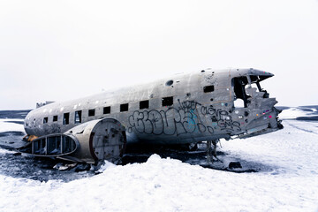Twisted wreckage from an airplane crash in Iceland on Solheimasandur black sand beach