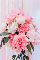 Beautiful wedding bouquet. Delicate petals of white and red roses.