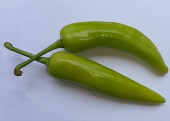 Green capsicum on a white plate