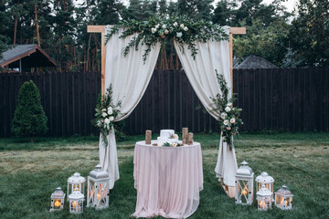 Wedding flower decorations from roses. Decoration for the ceremony.
