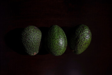 Close-up of fresh avocado on black background