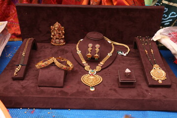 Indian bride golden jewellery set in wedding celebration