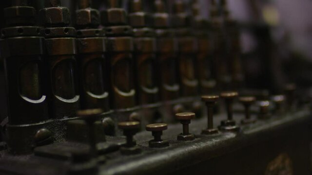 old rusted metal valves of an old machine with patina - alte verostete Ventile aus Metall einer alten Maschine mit Patina