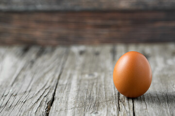 Close-up view of raw eggs isolated on Brown background.