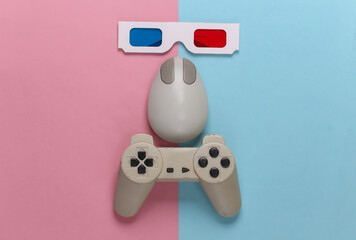 Retro entertainment. Old-fashioned pc mouse, gamepad, anaglyph stereo glasses on blue pink...