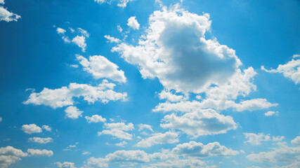 White hairy clouds on a blue sky. Use as background.