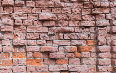 Obraz premium old red brick wall with cracks from time