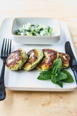 vegan lentils burgers with cucumber salad and mint