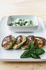 vegan lentils burgers with cucumber salad and mint